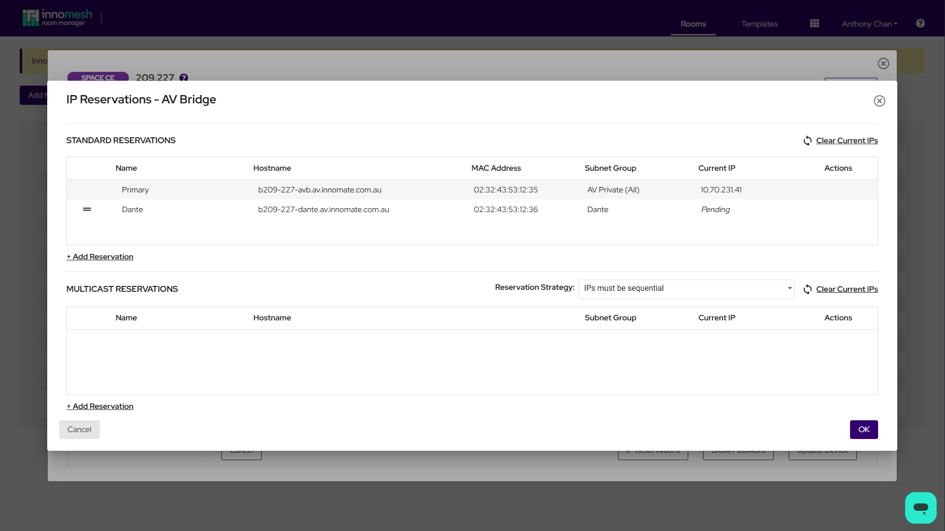 IP Reservations modal showing Standard Reservations and Multicast Reservations tables for a device